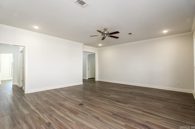 empty room featuring ornamental molding, ceiling fan, and dark wood-type flooring