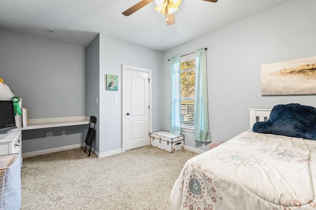 bedroom with ceiling fan and light carpet