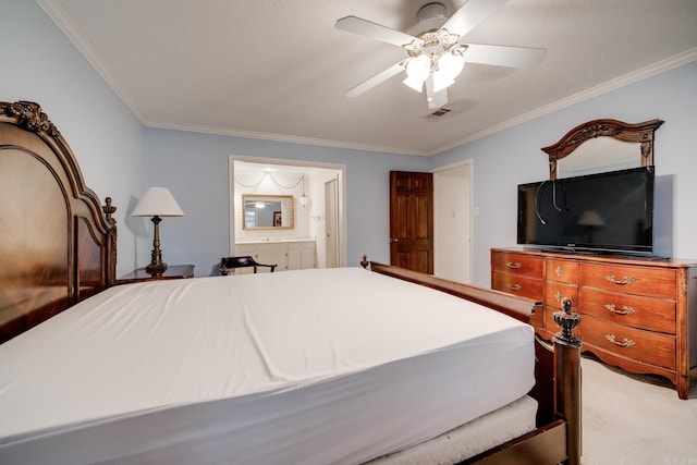 bedroom featuring light carpet, ensuite bathroom, ceiling fan, ornamental molding, and a textured ceiling