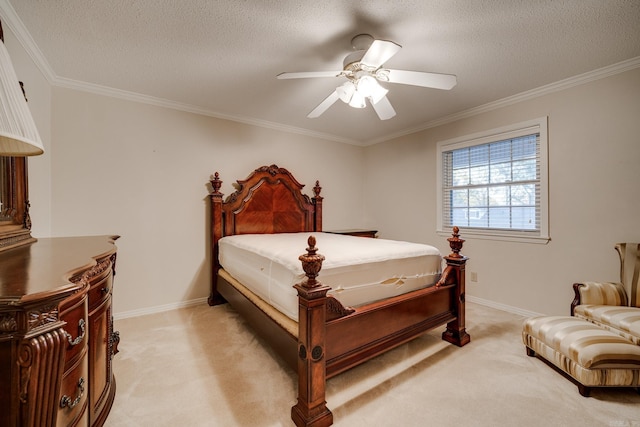 carpeted bedroom featuring a textured ceiling, ceiling fan, and crown molding