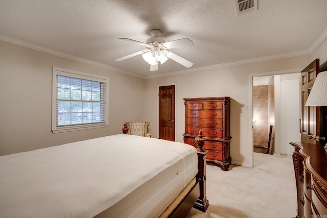 bedroom with light carpet, a textured ceiling, ceiling fan, and crown molding