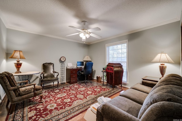 living room with hardwood / wood-style floors, ceiling fan, ornamental molding, and a textured ceiling