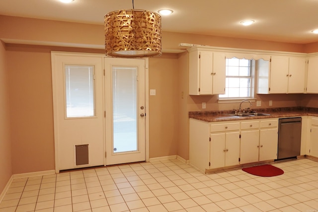 kitchen with dishwasher, pendant lighting, white cabinetry, and sink