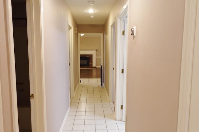 hallway with light tile patterned floors