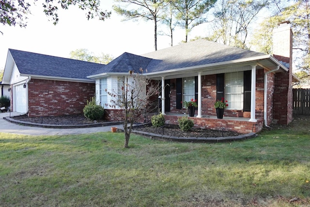 single story home with a porch, a garage, and a front lawn