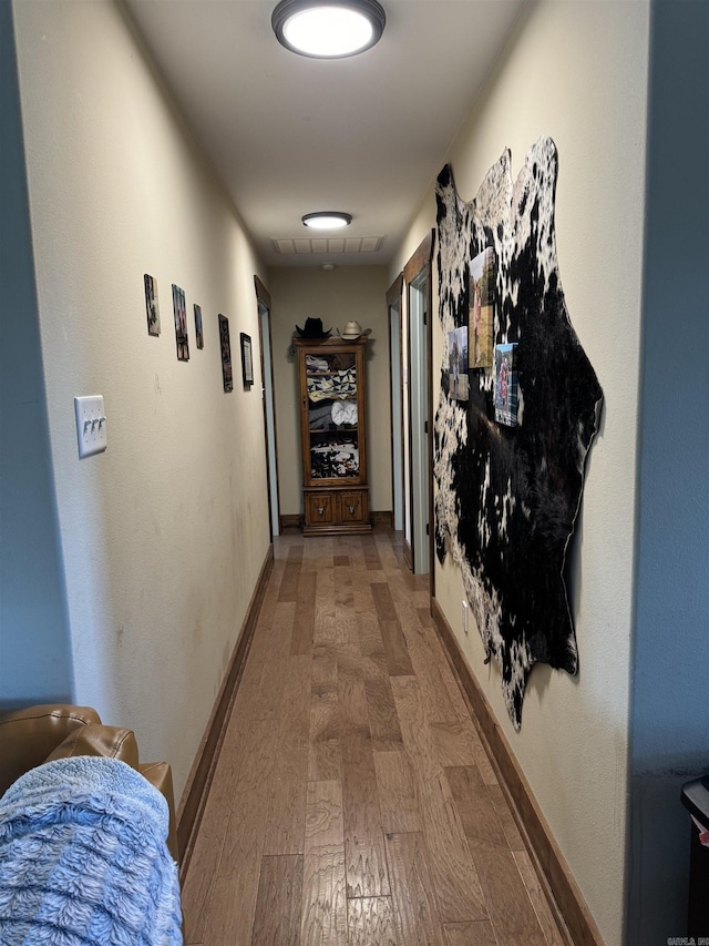 24923 Colonel Glenn Rd, Little Rock, AR 72210 - hall featuring wood finished floors and baseboards