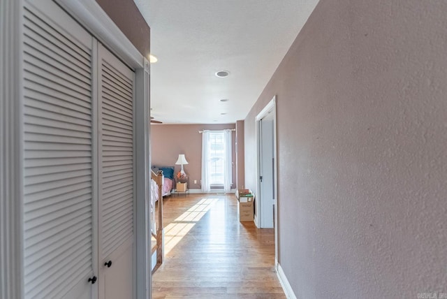 hallway featuring light hardwood / wood-style floors