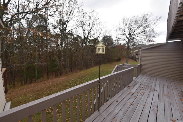 wooden deck with a yard