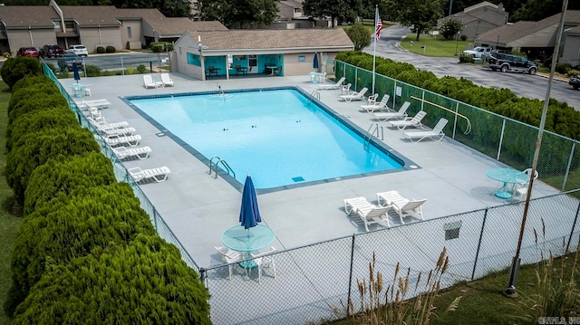 view of pool featuring a patio area