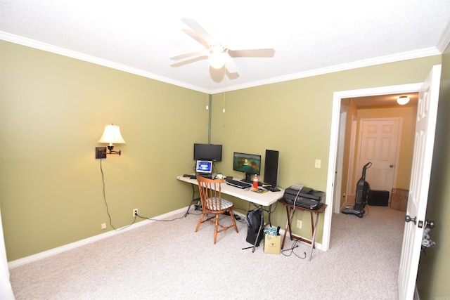 office space with carpet, ceiling fan, and crown molding