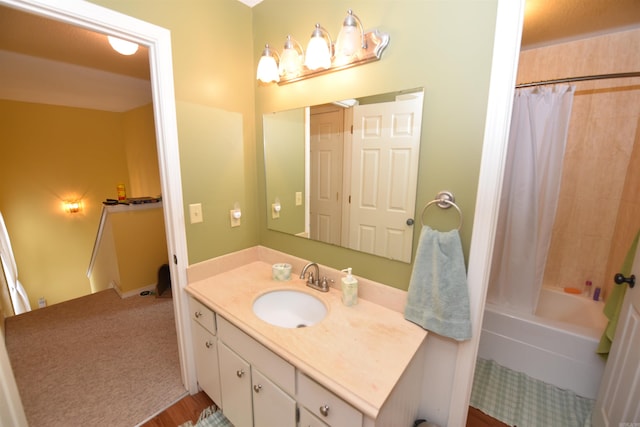 bathroom featuring shower / bath combo, vanity, and hardwood / wood-style flooring