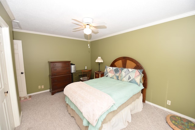 bedroom featuring ceiling fan, ornamental molding, light carpet, and a closet