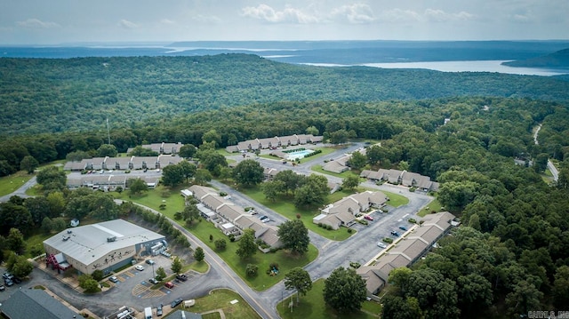 drone / aerial view with a water view