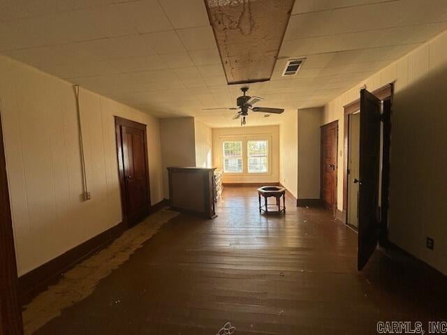 hall with dark hardwood / wood-style floors