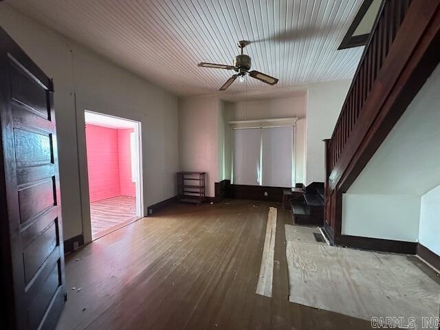 unfurnished room featuring hardwood / wood-style floors and ceiling fan