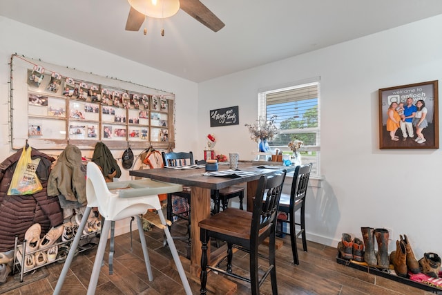 dining area featuring dark hardwood / wood-style floors and ceiling fan