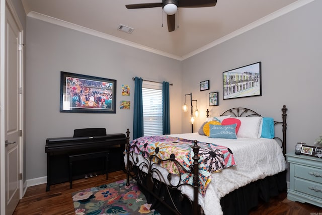 bedroom with ceiling fan, dark hardwood / wood-style floors, and ornamental molding