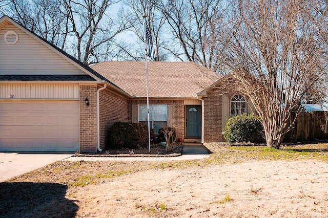 ranch-style home featuring a garage