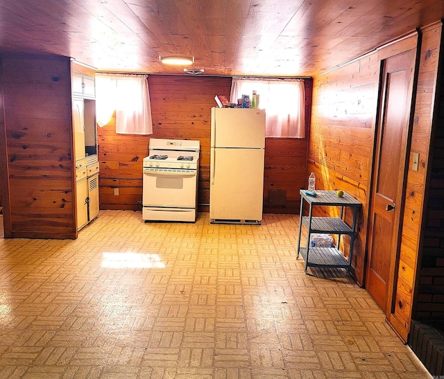 kitchen with wooden walls, wooden ceiling, and white appliances