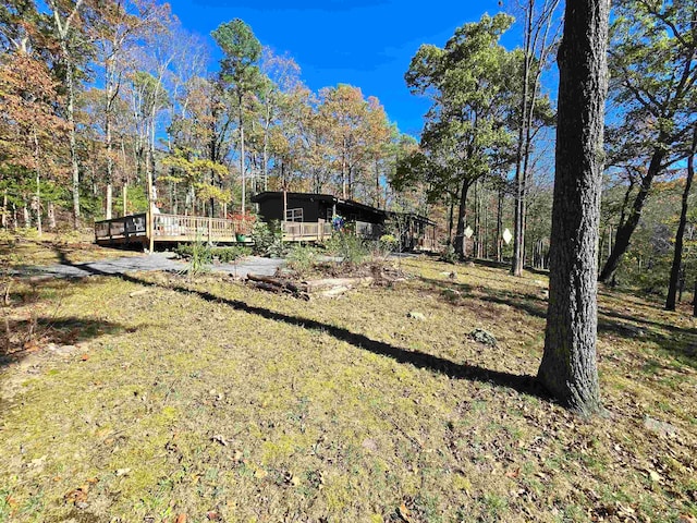 view of yard with a deck