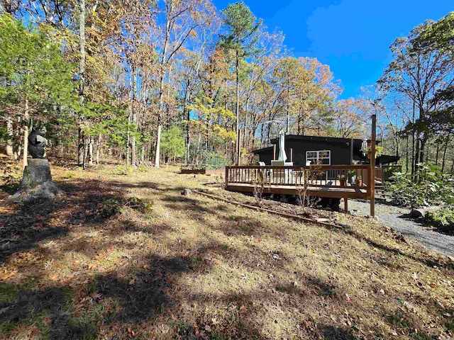 view of yard featuring a deck