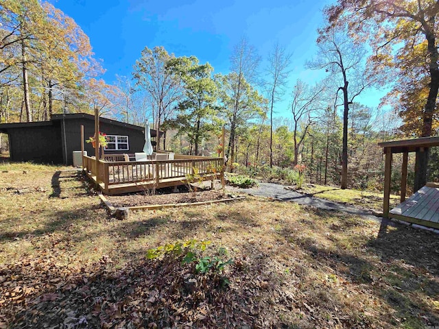 view of yard with a deck