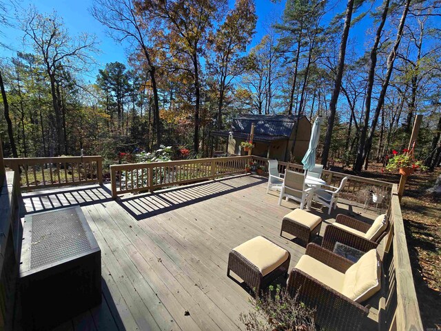 deck featuring a shed