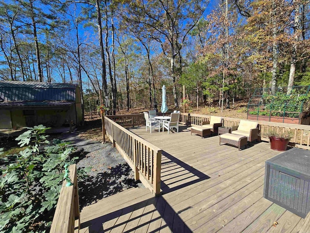 wooden deck with an outdoor hangout area