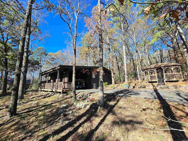 exterior space featuring a wooden deck