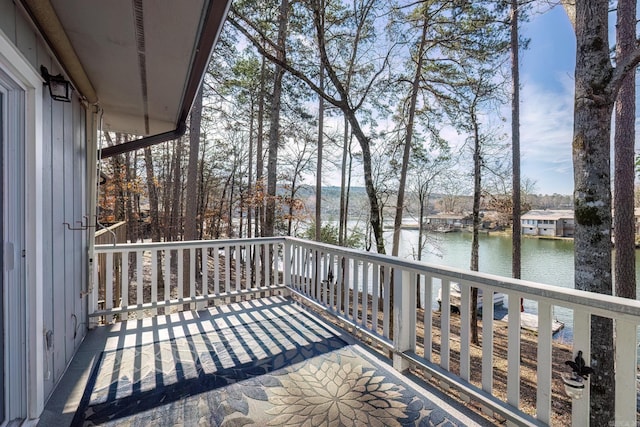 balcony featuring a water view