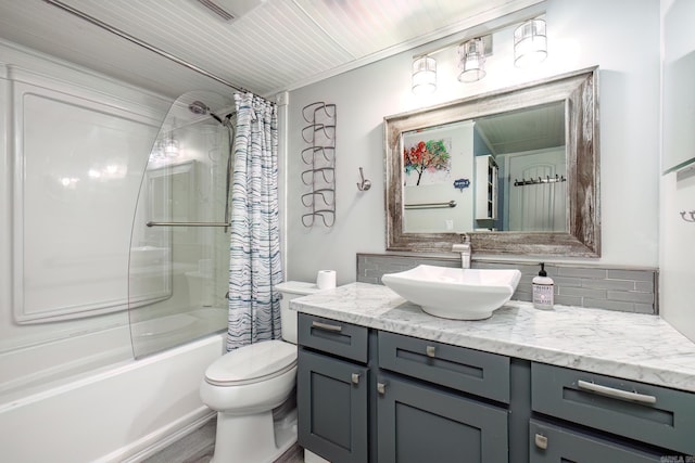 full bathroom with shower / bath combination with curtain, vanity, toilet, and backsplash