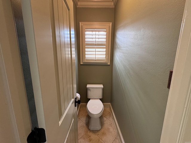 bathroom featuring tile patterned floors and toilet