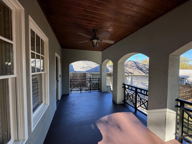 view of patio / terrace featuring ceiling fan and a balcony