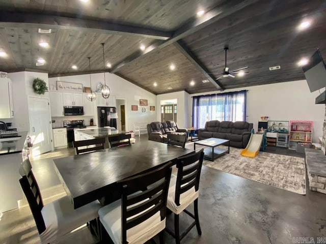 dining area with ceiling fan with notable chandelier, lofted ceiling with beams, wooden ceiling, and sink