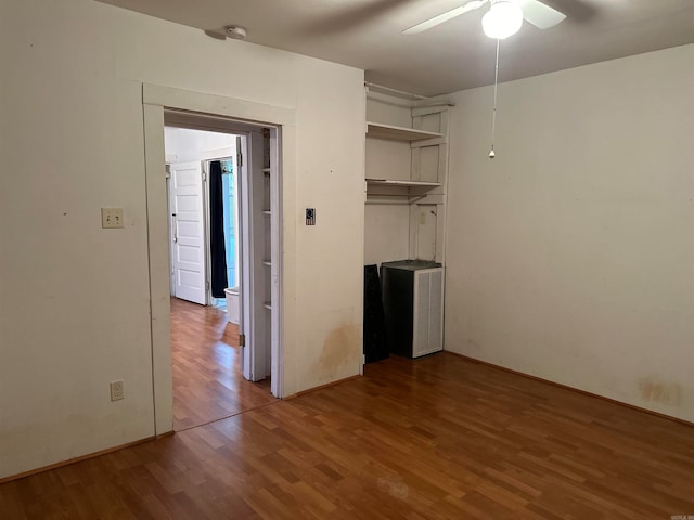 interior space featuring ceiling fan and wood-type flooring