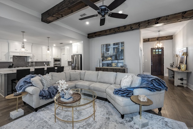 3025 Bordeaux Cv, Alexander, AR 72002 - living room featuring beamed ceiling, dark wood-type flooring, recessed lighting, a ceiling fan, and baseboards