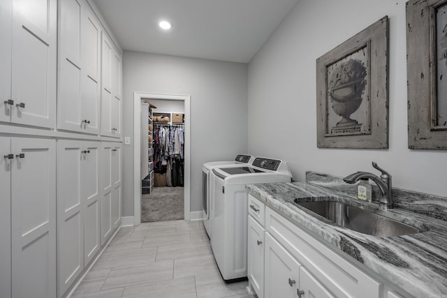 3025 Bordeaux Cv, Alexander, AR 72002 - washroom with separate washer and dryer, cabinet space, recessed lighting, and baseboards
