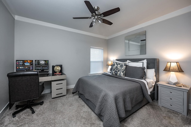 bedroom featuring ceiling fan, crown molding, and light colored carpet