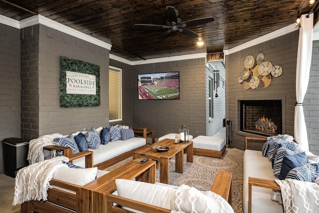 living room featuring a fireplace, wood ceiling, ornamental molding, and brick wall