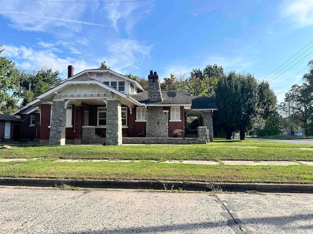 view of front of property with a front lawn