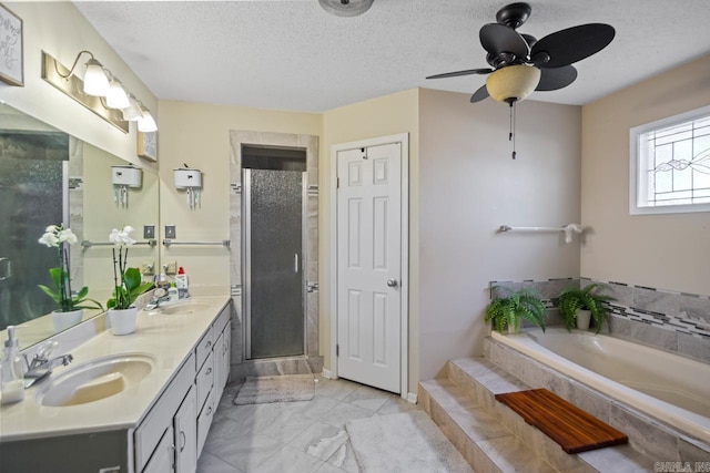 bathroom with vanity, a textured ceiling, separate shower and tub, and ceiling fan