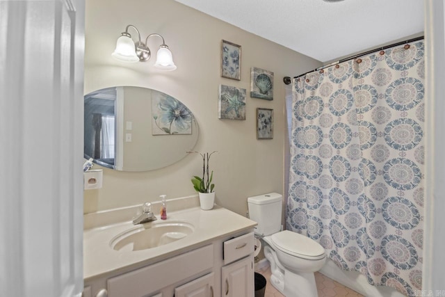 bathroom featuring a shower with shower curtain, vanity, and toilet