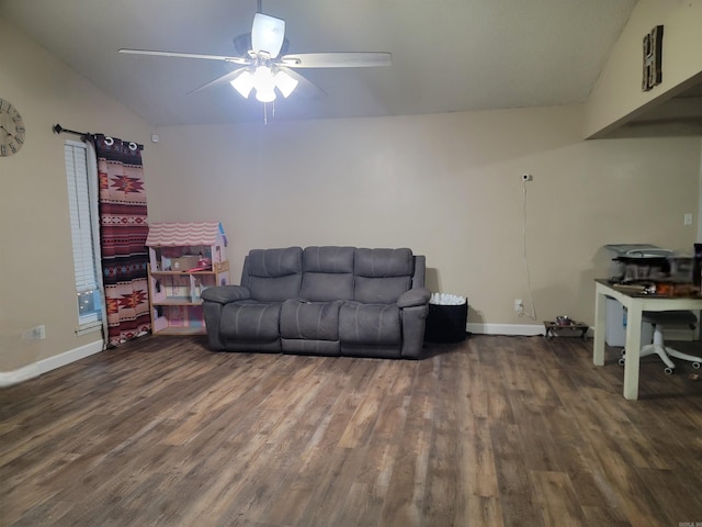 living room featuring ceiling fan, dark wood-type flooring, and vaulted ceiling