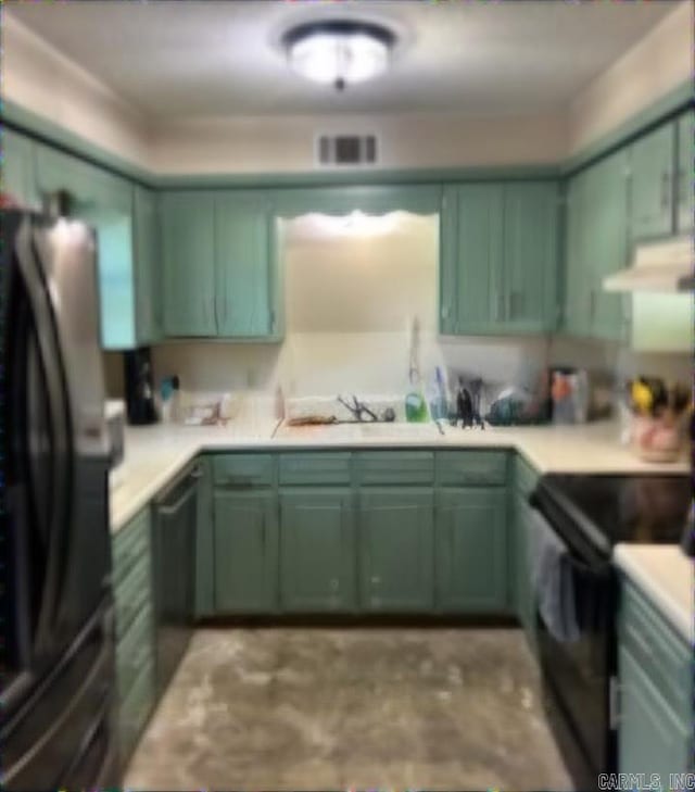 kitchen featuring refrigerator, black range with electric cooktop, ventilation hood, sink, and green cabinetry