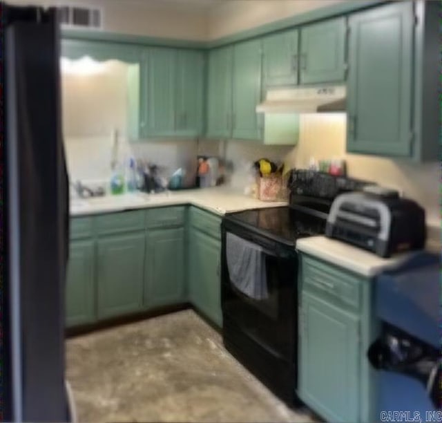 kitchen with electric range and green cabinets