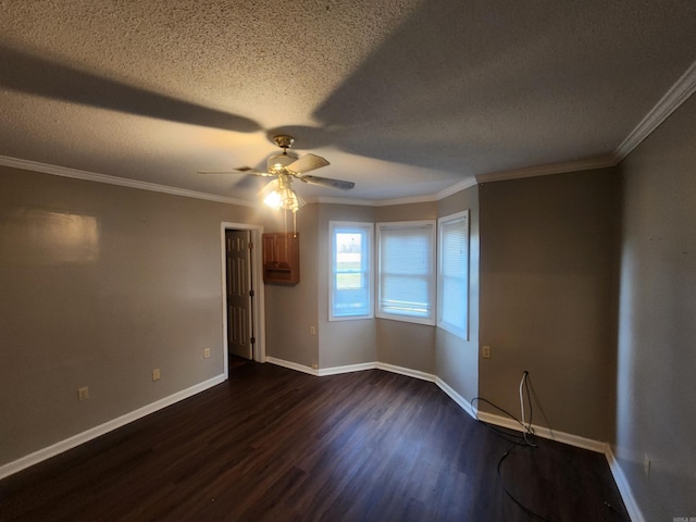 empty room with crown molding, ceiling fan, dark wood-type flooring, and a textured ceiling