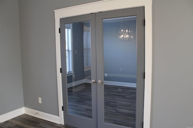 view of exterior entry featuring french doors