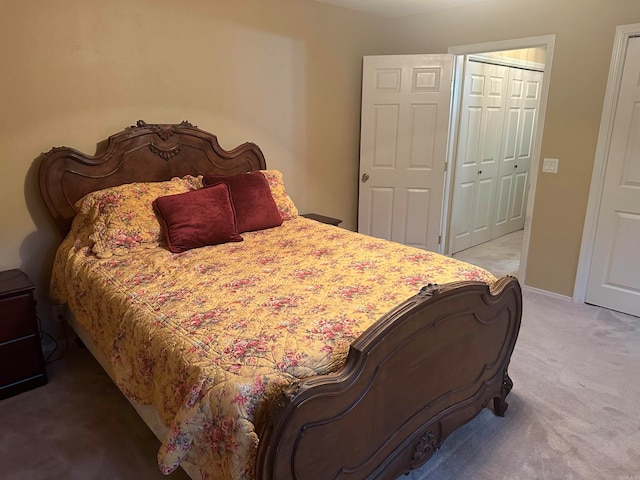 bedroom with carpet floors and a closet