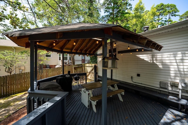 wooden deck featuring a gazebo