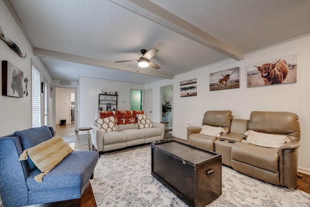 living room featuring ceiling fan, beam ceiling, and wood-type flooring